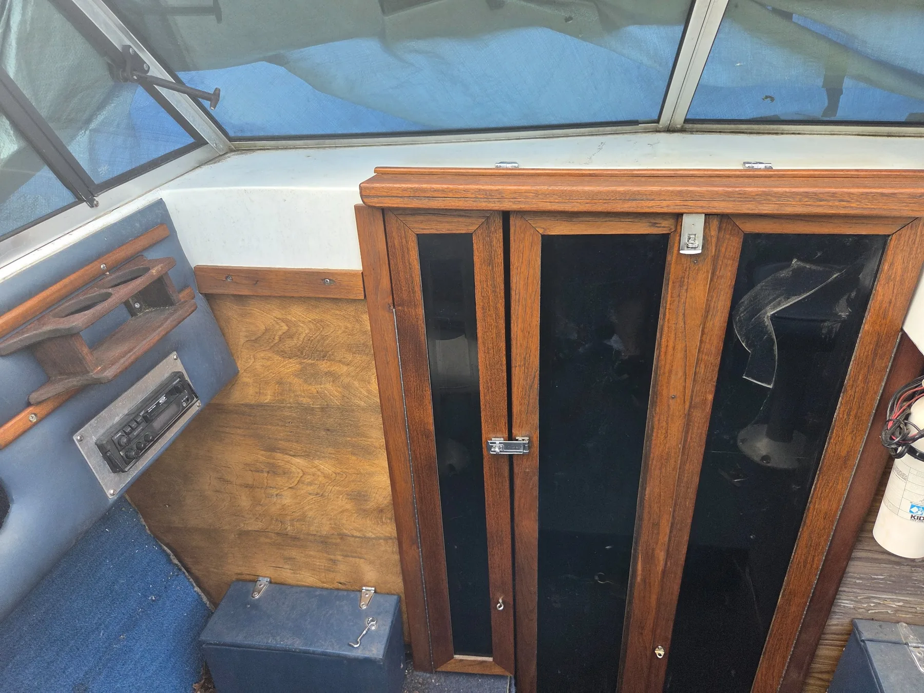 Forward cabin cabinetry, wood trim, and interior panels.