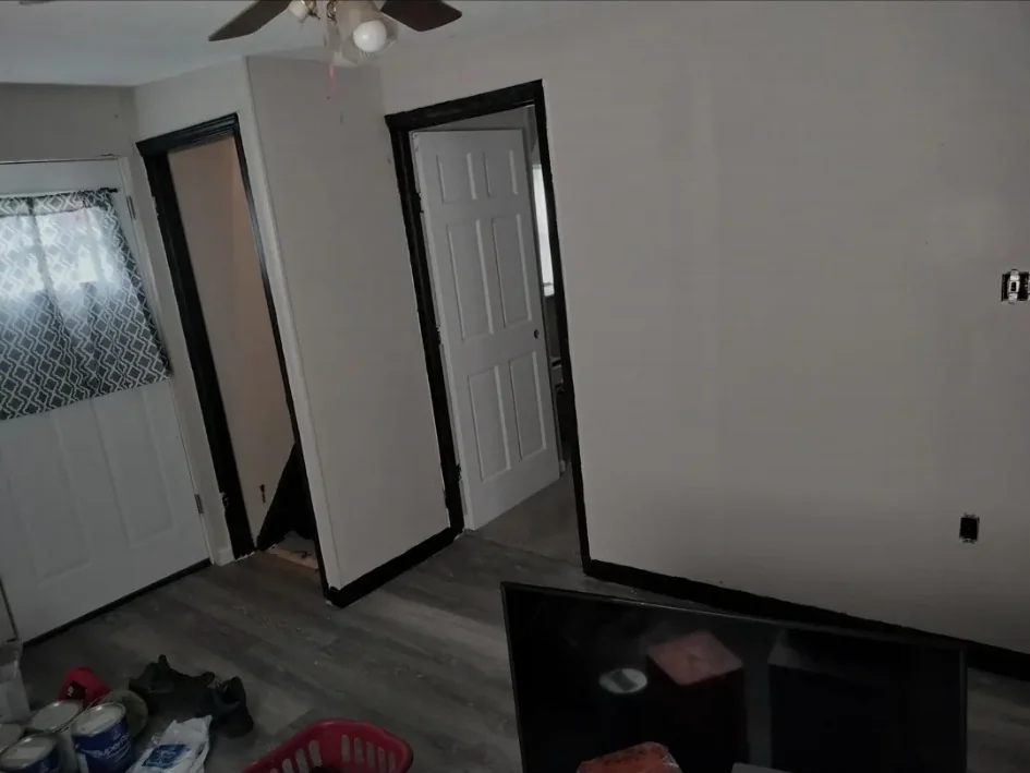 Main room after wall, trim, floor, and door work.